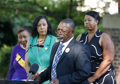 NAACP Virginia President Robert N. Barnette Jr. speaks near the Virginia Capitol, July 18, 2023, in Richmond, Va. From left, Denise Harrington, Gaylene Kanoyton, Barnette and Karen Jones attended the news conference. The Virginia NAACP said Monday, Nov. 6, that Gov. Glenn Youngkin's administration lacks clear standards for how it restores voting rights for convicted felons who served their sentences, leaving many frustrated and unable to vote in the nationally watched state elections on Tuesday,