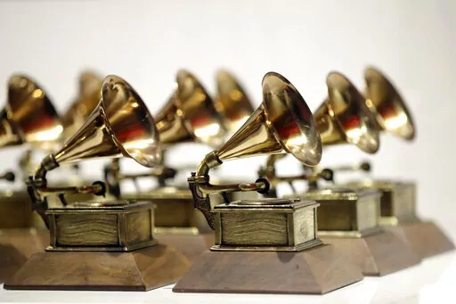 Grammy Awards are displayed at the Grammy Museum Experience at Prudential Center in Newark, N.J. on Oct. 10, 2017. The Grammys are adding a special song for social change award and five new categories including songwriter of the year, giving the Recording Academy an avenue to honor music’s best composer. (AP Photo/Julio Cortez, File)