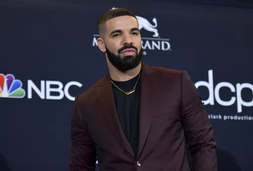 Drake poses at the Billboard Music Awards in Las Vegas on May 1, 2019. Police are investigating a shooting outside rapper Drake’s mansion that left a security guard seriously wounded. Authorities did not confirm whether Drake was at home at the time of the shooting, but said his team is cooperating. The shooting happened around 2 a.m. Tuesday in the affluent Bridle Path neighborhood of Toronto. (Photo by Richard Shotwell/Invision/AP, File)