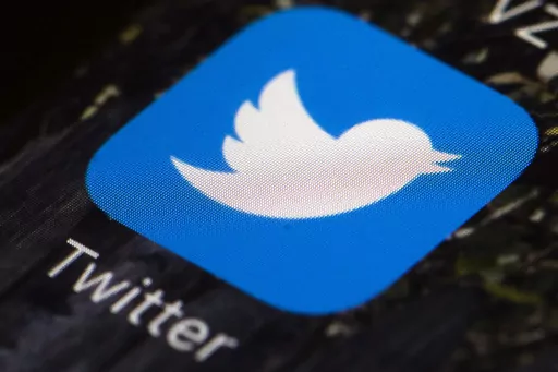 A Twitter app icon on a mobile phone is displayed April 26, 2017, in Philadelphia. TikTok and Instagram users can scroll with abandon. But Twitter owner Elon Musk has put new curfews on his digital town square, the latest drastic change to the social media platform that could further drive away advertisers and undermine its cultural influence as a trend-setter. (AP Photo/Matt Rourke, File)