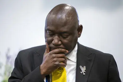Civil rights attorney Ben Crump takes part in a press conference at the Renaissance Church of God in Christ Family Life Center in Grand Rapids, Mich. on Thursday, April 14, 2022. Crump is representing the family of Patrick Lyoya, who was shot and killed by a Grand Rapids Police Department officer on April 4. (Cory Morse/The Grand Rapids Press via AP)