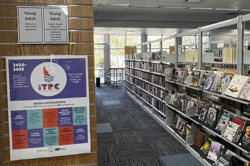 Shelves of books in the "young adult" section of a public library in Eagle, Idaho, are seen on Feb. 5, 2024. (AP Photo/Rebecca Boone)