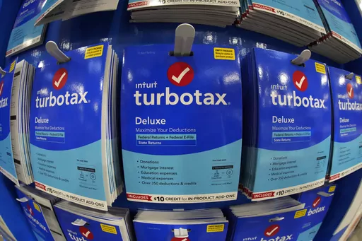 This is a display of TurboTax on display in a Costco Warehouse in Pittsburgh on Thursday, Jan. 26, 2023. In a settlement agreement last year, TurboTax’s owner Intuit Inc. was ordered to pay $141 million to low-income consumers who were deceived into paying TurboTax to file their federal returns — despite being eligible for free, federally-supported tax services. (AP Photo/Gene J. Puskar)