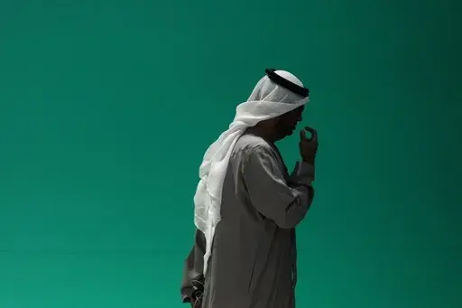 COP28 President Sultan al-Jaber leaves a plenary session at the COP28 U.N. Climate Summit, Wednesday, Dec. 13, 2023, in Dubai, United Arab Emirates. (AP Photo/Kamran Jebreili)