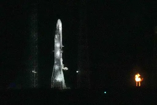 Blue Origin's New Glenn rocket is seen on Launch Complex 36 shortly before the launch attempt was scrubbed at the Cape Canaveral Space Force Station, Monday, Jan. 13, 2025, in Cape Canaveral, Fla. (AP Photo/John Raoux)