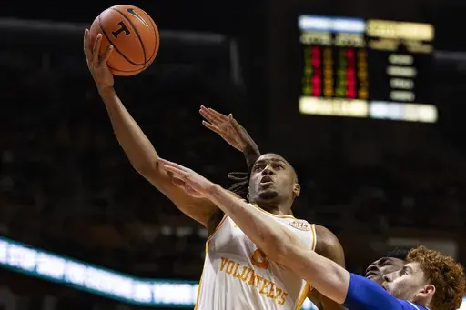 Tennessee guard Chaz Lanier (2) shoots during the first half of an NCAA college basketball game against Middle Tennessee, Monday, Dec. 23, 2024, in Knoxville, Tenn. (AP Photo/Wade Payne)