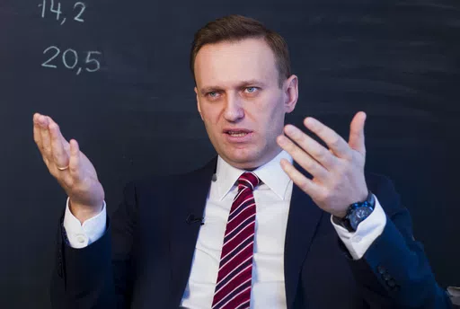 Russian opposition politician Alexei Navalny gestures while speaking during his interview to the Associated Press in Moscow, Russia on Dec. 18, 2017. U.S. intelligence officials have determined that Russian President Vladimir Putin likely didn't order the death of Navalny, the imprisoned opposition leader, in February of 2024. An official says the U.S. intelligence community has found "no smoking gun" that Putin was aware of the timing of Navalny's death or directly ordered it. (AP Photo/Alexand