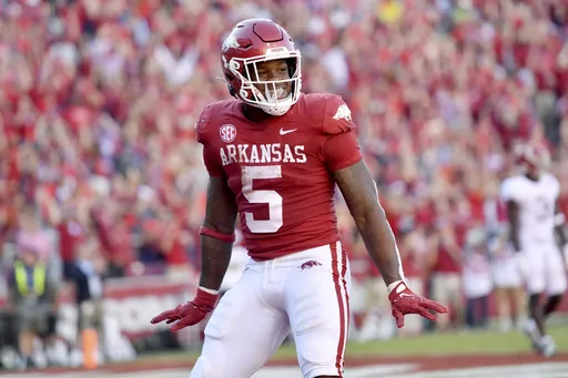 Arkansas running back Raheim Sanders (5) celebrates after a touchdown against Alabama during an NCAA college football game Saturday, Oct. 1, 2022, in Fayetteville, Ark. Arkansas opens their season at home against Western Carolina on Sept. 2. (AP Photo/Michael Woods, File)