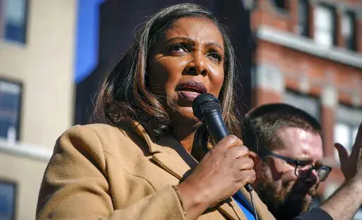 New York Attorney General Letitia James speaks during a rally in support of home care workers in New York, Tuesday, Dec. 14, 2021. Former President Donald Trump recently told a mostly white crowd at a rally in Texas that his legal troubles are the fault of Black prosecutors he called racists. Trump repeated his charges of racism  to underscore his contention that he couldn’t possibly be treated fairly by Black officials who are leading Trump investigations in New York and Georgia. (AP Photo/S