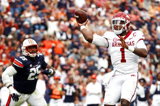 Arkansas quarterback KJ Jefferson (1) throws a pass against Auburn during the first half of an NCAA college football game, Saturday, Oct. 29, 2022, in Auburn, Ala. (AP Photo/Butch Dill)
