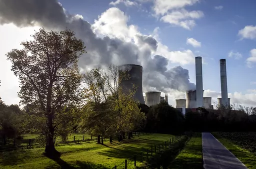 Steam rises from the coal-fired power plant Niederaussem, Germany, on Nov. 2, 2022. The cause of global warming is showing no signs of slowing as heat-trapping carbon dioxide in Earth’s atmosphere increased to record highs in its annual Spring peak, jumping at one of the fastest rates on record, officials announced Monday, June 5, 2023. (AP Photo/Michael Probst, File)