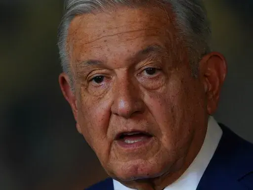 Mexican President Andres Manuel Lopez Obrador speaks during his State of the Nation address at the National Palace in Mexico City, Sept. 1, 2022. In Mexico, a long list of nonviolent crimes bring automatic pretrial detention, with no bail or house arrest allowed. The country's Supreme Court is expected to rule soon on that policy. President Obrador has expanded the number of crimes considered ineligible for bail and he has publicly called on the Supreme Court not to release more people pending t