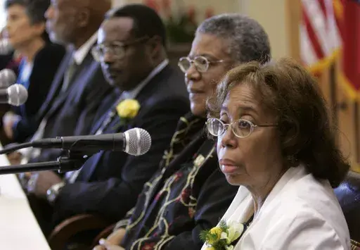Thelma Mothershed Wair, right, speaks at a news conference in Little Rock, Ark., Sept. 23, 2007, as Carlotta Walls LaNier, from left, Terrence Roberts, Jefferson Thomas, and Minnijean Brown Trickey, members of the Little Rock Nine who in 1957 integrated Little Rock Central High School, look on. (AP Photo/Danny Johnston, File)