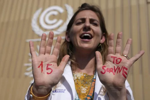 A demonstrator shows her hands reading "1.5 to survive" at a protest advocating for the warming goal at the COP27 U.N. Climate Summit, Nov. 16, 2022, in Sharm el-Sheikh, Egypt. There’s a two-out-of-three chance within the next five years that the world will temporarily reach the internationally accepted global temperature threshold for limiting the worst effects of climate change, a new World Meteorological Organization report forecasts on Wednesday, May 17, 2023. (AP Photo/Peter Dejong, File)
