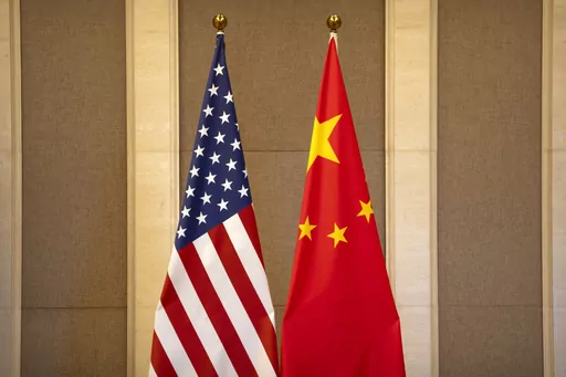 United States and Chinese flags are set up before a meeting between Treasury Secretary Janet Yellen and Chinese Vice Premier He Lifeng at the Diaoyutai State Guesthouse in Beijing, on July 8, 2023. China said the United States is the "biggest disruptor of regional peace and stability" in the world in a scathing response Wednesday, Oct. 25, 2023 to a Pentagon report on China's growing military buildup. (AP Photo/Mark Schiefelbein, Pool, File)