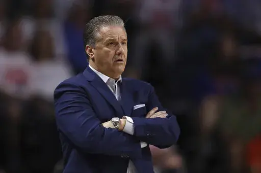 University of Kentucky men's basketball head coach John Calipari stands on the sidelines during the first half of the team's NCAA college basketball game against Florida, March 5, 2022, in Gainesville, Fla. Kentucky will play its annual Blue-White men’s basketball scrimmage in eastern Kentucky to benefit victims from devastating summer floods in the region. The school announced that the Oct. 22 event at Appalachian Wireless Arena in Pikeville will feature a pregame Fan Fest. Ticket proceeds wi