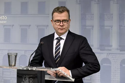 Finnish Prime Minister Petteri Orpo meets the media in Helsinki, Finland, Tuesday, Oct. 10, 2023. Finnish and Estonian gas system operators on Sunday said they noted an unusual drop in pressure in the Balticconnector pipeline after which they shut down the gas flow. The Finnish government on Tuesday said there was damage both to the gas pipeline and to a telecommunications cable between the two NATO countries. (Jussi Nukari/Lehtikuva via AP)