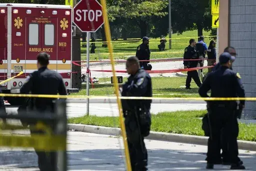 Police investigate a shooting near King Park during the second day of the 2024 Republican National Convention, Tuesday, July 16, 2024, in Milwaukee. The shooting occurred outside of the security perimeter for the Republican National Convention. (AP Photo/Alex Brandon)