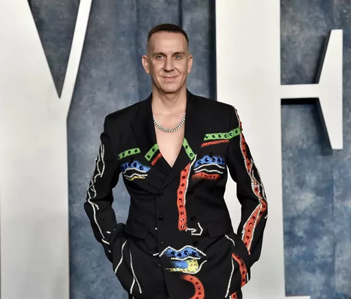 Jeremy Scott appears at the Vanity Fair Oscar Party on Sunday, March 12, 2023, at the Wallis Annenberg Center for the Performing Arts in Beverly Hills, Calif. Scott is stepping down as creative director of Italian luxury house Moschino after a decade of wild and wacky fashion shows and his elegant dressing of numerous celebrities.The company made the announcement Monday in an email statement. (Photo by Evan Agostini/Invision/AP, File)