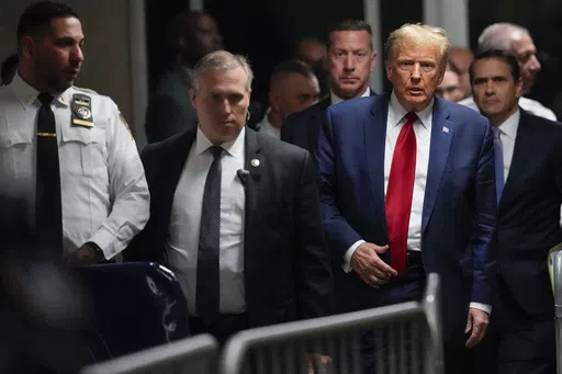 Former President Donald Trump leaves Manhattan criminal court, Feb. 15, 2024, in New York. Judge Juan Manuel Merchan agreed Friday, March 16, to delay former President Donald Trump’s hush-money criminal trial in New York until mid-April after his lawyers said they needed more time to sift through new evidence. (AP Photo/Mary Altaffer, File)
