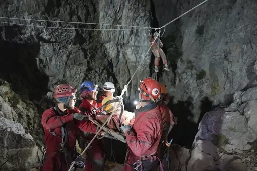 In this photo released by Turkish government's Search and Rescue agency AFAD, American researcher Mark Dickey, center, is pulled out of Morca cave near Anamur, south Turkey, on early Tuesday, Sept. 12, 2023, more than a week after he became seriously ill 1,000 meters (more than 3,000 feet) below its entrance. Teams from across Europe had rushed to Morca cave in southern Turkey's Taurus Mountains to aid Dickey, a 40-year-old experienced caver who became seriously ill on Sept. 2 with stomach bleed