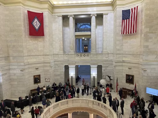 Dozens of candidates fill the Arkansas state Capitol rotunda on Monday, Nov. 6, 2023 for the first day of filing period for the 2024 election in the state. (AP Photo/Andrew DeMillo)