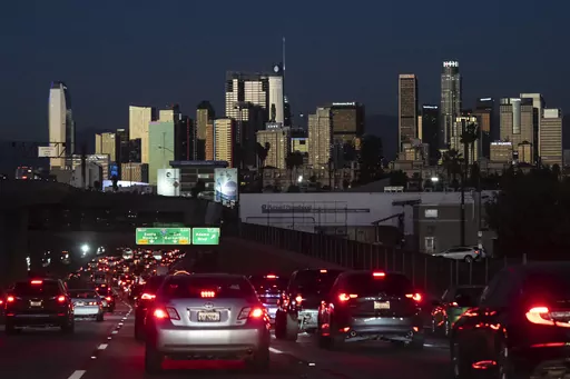 Traffic moves along the 110 Freeway in Los Angeles, Tuesday, Nov. 22, 2022. If the auto industry boosts electric vehicle sales to the level the Environmental Protection Agency recommends, any reduction in pollution could prove more modest than the agency expects. The Associated Press has estimated that nearly 80% of vehicles being driven in the U.S. — more than 200 million — would still run on gasoline or diesel fuel. (AP Photo/Jae C. Hong, File)