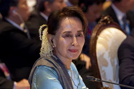 Myanmar leader Aung San Suu Kyi participates in the ASEAN-Japan summit in Nonthaburi, Thailand on Nov. 4, 2019. A legal official says ousted Myanmar leader Aung San Suu Kyi has been sentenced to 5 years in prison in the first of several corruption cases. (AP Photo/Gemunu Amarasinghe, File)