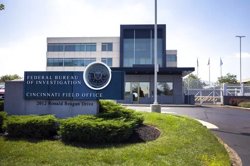 The entrance to the FBI headquarters in Cincinnati, on Aug. 11, 2022. An armed man decked out in body armor tried to breach a security screening area at the FBI field office. Federal authorities and experts who study online extremism are warning of the risk of additional attacks on federal law enforcement following the FBI's search of ex-President Donald Trump's Florida home, Mar-a-Lago. (Liz Dufour/The Cincinnati Enquirer via AP, File)