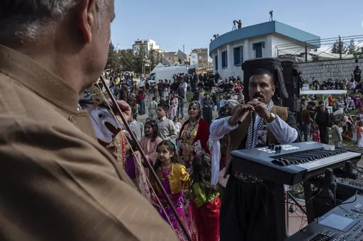 Iraqi Kurds celebrate Nowruz, a Persian New Year, in Sulaimaniyah, Iraq, Monday, March 20, 2023. The Kurdish in Iraq region won de facto self-rule in 1991 when the United States imposed a no-fly zone over it in response to Saddam's brutal repression of Kurdish uprisings. With American invasion 20 years ago much of Iraq fell into chaos, as occupying American forces fought an insurgency and as multiple political and sectarian communities vied to fill the power vacuum left in Baghdad. But the Kurds
