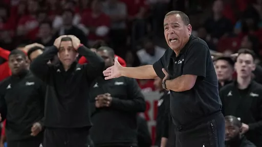 Houston coach Kelvin reacts to a foul call during the second half of an NCAA college basketball game against Central Florida Saturday, Dec. 31, 2022, in Houston. The way Houston’s coach sees it, the people running programs had better evolve quickly to manage demands that are only becoming more far-reaching by the day – even amid the heat of the NCAA Tournament pushing into its second weekend. (AP Photo/David J. Phillip, File)