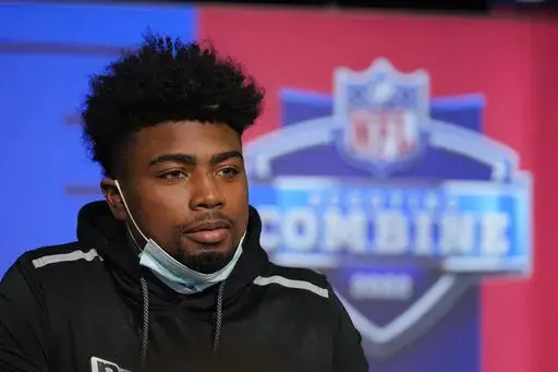 Arkansas wide receiver Treylon Burks speaks during a press conference at the NFL football scouting combine, Wednesday, March 2, 2022, in Indianapolis. (AP Photo/Darron Cummings)