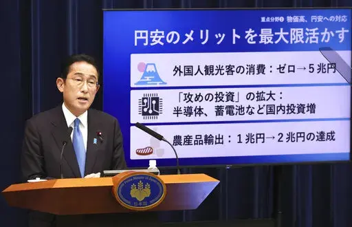 Japanese Prime Minister Fumio Kishida speaks during a news conference at his official residence in Tokyo, Friday Oct. 28, 2022. Kishida’s government approved Friday a hefty economic package that will include government funding of about 29 trillion yen ($200 billion) to soften the burden of costs from rising utility rates and food prices. (Yoshikazu Tsuno/Pool Photo via AP)
