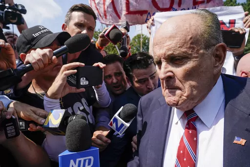 Rudy Giuliani speaks outside the Fulton County jail, Wednesday, Aug. 23, 2023, in Atlanta. Giuliani on Friday, Sept. 1, pleaded not guilty to Georgia charges that accuse him of trying, along with former President Donald Trump and others, to illegally overturn the results of the 2020 election in the state. (AP Photo/Brynn Anderson, File)