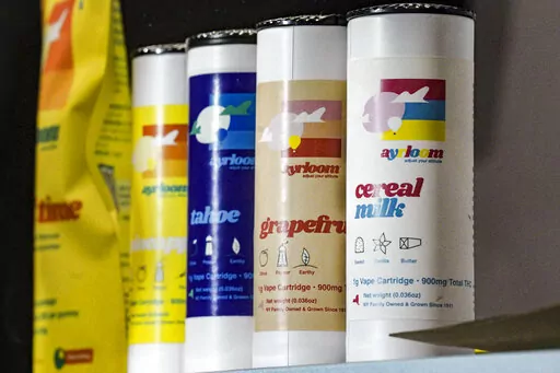 HOLD FOR STORY FILE - Cannabis vaping products are showcased at Housing Works, New York's first legal cannabis dispensary, Thursday Dec. 29, 2022, in New York. As New York opens more legal outlets for recreational marijuana, some public health advocates want more scrutiny on how marijuana products are being marketed to teens and young adults. (AP Photo/Bebeto Matthews, File)