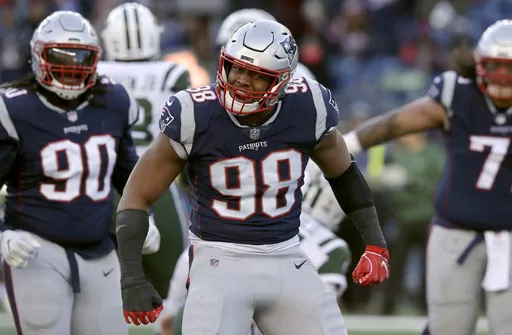 New England Patriots defensive end Trey Flowers reacts after sacking New York Jets quarterback Sam Darnold during the second half of an NFL football game, Sunday, Dec. 30, 2018, in Foxborough, Mass. The New England Patriots announced Tuesday, Aug. 8, 2023, that they have signed DE Trey Flowers. Flowers spent his first four seasons with New England from 2015 through the 2018 season and was a part of two Super Bowl wins with the Patriots in 2016 and 2018.(AP Photo/Charles Krupa, File)
