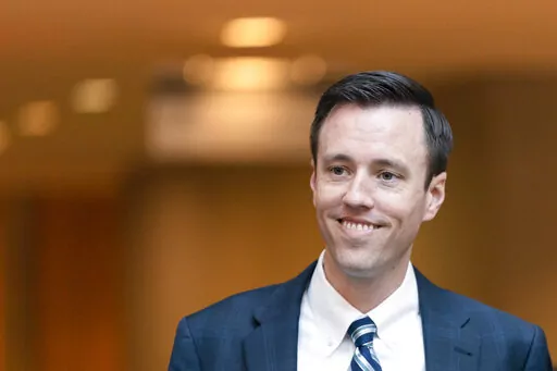 Former White House deputy press secretary Judd Deere, leaves O'Neil House Office Building, after appearing before the House committee investigating the Jan. 6 Capitol insurrection, Thursday, March 3, 2022, in Washington.  Deere is joining Sarah Sanders' campaign for Arkansas governor.  Sanders' campaign on Tuesday, Aug. 2, announced Deere will serve as its communications director. Sanders, a Republican, is running against Democrat Chris Jones for Arkansas governor. Deere was among several senior