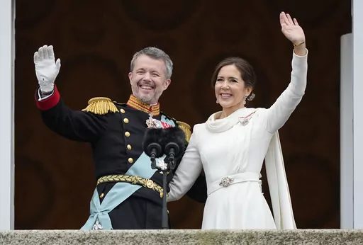 Denmark's King Frederik X and Denmark's Queen Mary wave from the balcony of Christiansborg Palace in Copenhagen, Denmark, Sunday, Jan. 14, 2024. Denmark's new King Frederik X who was proclaimed king on Jan. 14, and his Australian-born wife Queen Mary will visit Sweden and Norway in May on their first foreign state visit, the palace said Friday, Feb. 9, 2024. (AP Photo/Martin Meissner, File)