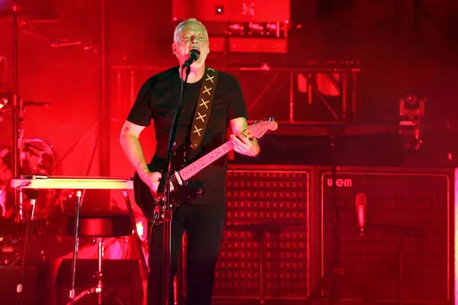 David Gilmour performs in the ancient roman amphitheater of the Pompeii archeological site, Italy, Thursday, July 7, 2016. Pink Floyd is releasing its first new music in almost three decades to raise money for the people of Ukraine, the band announced Thursday, April 7, 2022. “Hey Hey Rise Up” features Pink Floyd members David Gilmour and Nick Mason, with vocals from Ukrainian singer Andriy Khlyvnyuk of the band BoomBox. (AP Photo/Gregorio Borgia, File)