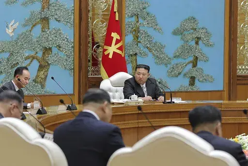 In this photo provided by the North Korean government, North Korea leader Kim Jong Un, center, attends a Politburo meeting in Pyongyang, North Korea Wednesday, Sept. 20, 2023. Independent journalists were not given access to cover the event depicted in this image distributed by the North Korean government. The content of this image is as provided and cannot be independently verified. (Korean Central News Agency/Korea News Service via AP)