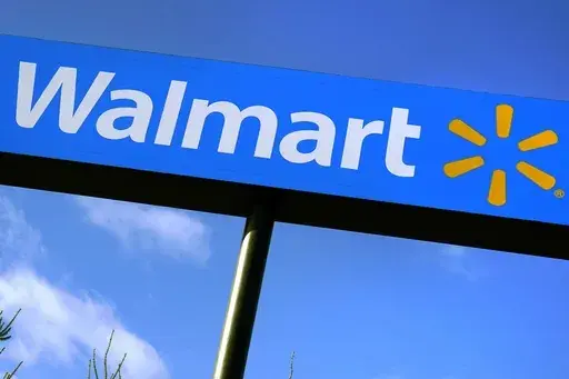 A Walmart store sign is visible from Route 28 Nov. 18, 2020, in Derry, N.H. (AP Photo/Charles Krupa, File)