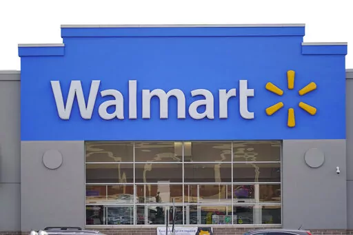 Shown is a Walmart location in Philadelphia, Wednesday, Nov. 17, 2021.  Walmart is teaming up with a fertility startup to offer benefits under its insurance plan that will help its workers expand their families. The nation’s largest retailer and private employer said Tuesday, Sept. 27, 2022,  it’s partnering with New York-based Kindbody to offer benefits such as in vitro fertilization as well as fertility testing regardless of sex, sexual orientation, gender identity, or marital status.  (AP