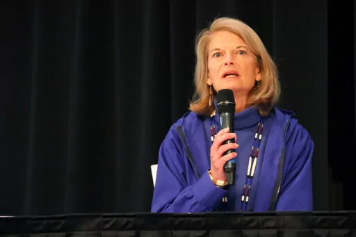 U.S. Sen. Lisa Murkowski, a Republican seeking re-election, answers a question during a candidate forum, Saturday, Oct. 22, 2022, in Anchorage, Alaska. She faces Republican Kelly Tshibaka and Democrat Pat Chesbro in the Nov. 8, 2022, election. (AP Photo/Mark Thiessen)