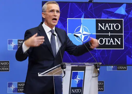 NATO Secretary General Jens Stoltenberg speaks during a media conference after an extraordinary meeting of NATO Ministers of Foreign Affairs via video link at NATO headquarters, in Brussels, Friday, Jan. 7, 2022. NATO foreign ministers on Friday discussed Russia's military build-up around Ukraine amid skepticism about the credibility of President Vladimir Putin's offer to ease tensions, ahead of a week of high-level diplomacy aimed at ending the standoff. (AP Photo/Olivier Matthys)