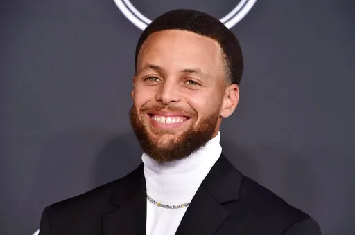 NBA basketball player Stephen Curry, of the Golden State Warriors, arrives at the ESPY Awards in Los Angeles on July 20, 2022.  Curry has a new children's book "I Have a Superpower.” (Photo by Jordan Strauss/Invision/AP, File)