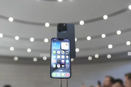 The iPhone 15 Pro is displayed during an announcement of new products on the Apple campus, Tuesday, Sept. 12, 2023, in Cupertino, Calif. (AP Photo/Jeff Chiu)