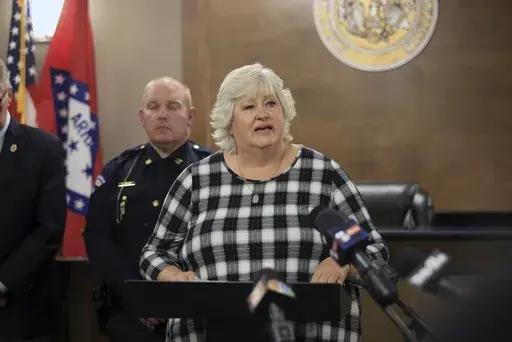 Colleen Nick speaks during a press conference at the headquarters of the Alma Police Department on Tuesday, Oct. 1, 2024, in Alma, Ark., about the 1995 kidnapping of her daughter Morgan Nick. (Colin Murphey/Arkansas Democrat-Gazette via AP)