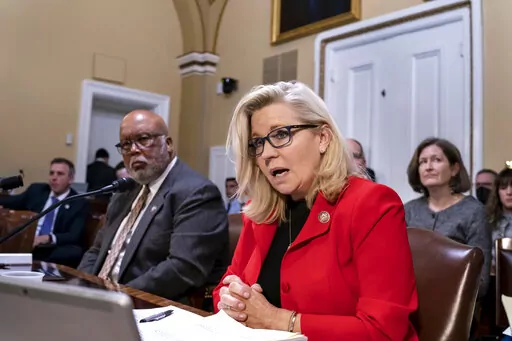 Rep. Liz Cheney, R-Wyo., vice chair of the House Select Committee investigating the Jan. 6 U.S. Capitol insurrection, joined at left by Chairman Bennie Thompson, D-Miss., testifies before the House Rules Committee seeking contempt of Congress charges against former Trump advisers Peter Navarro and Dan Scavino in response to their refusal to comply with subpoenas, at the Capitol in Washington, Monday, April 4, 2022. (AP Photo/J. Scott Applewhite, File)