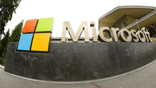 This July 3, 2014, file photo, shows the Microsoft Corp. logo outside the Microsoft Visitor Center in Redmond, Wash. In just the past month of Jan. 2023, there have been nearly 50,000 job cuts across the technology sector. Large and small tech companies went on a hiring spree in over the past several years due to a demand for their products, software and services surged with millions of people working remotely. (AP Photo Ted S. Warren, File)
