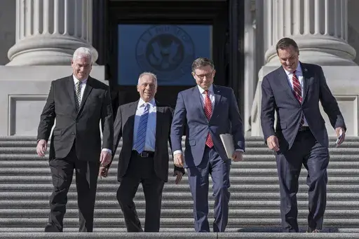 House Republican leaders, from left, Majority Whip Tom Emmer, R-Minn., Majority Leader Steve Scalise, R-La., Speaker of the House Mike Johnson, R-La., and Rep. Richard Hudson, R-N.C., chairman of the National Republican Congressional Committee, arrive to tout Republican wins and meet with reporters on the steps of the Capitol in Washington, Tuesday, Nov. 12, 2024. Congress returns to work this week to begin what is known as a lame-duck session — that period between Election Day and the end of 